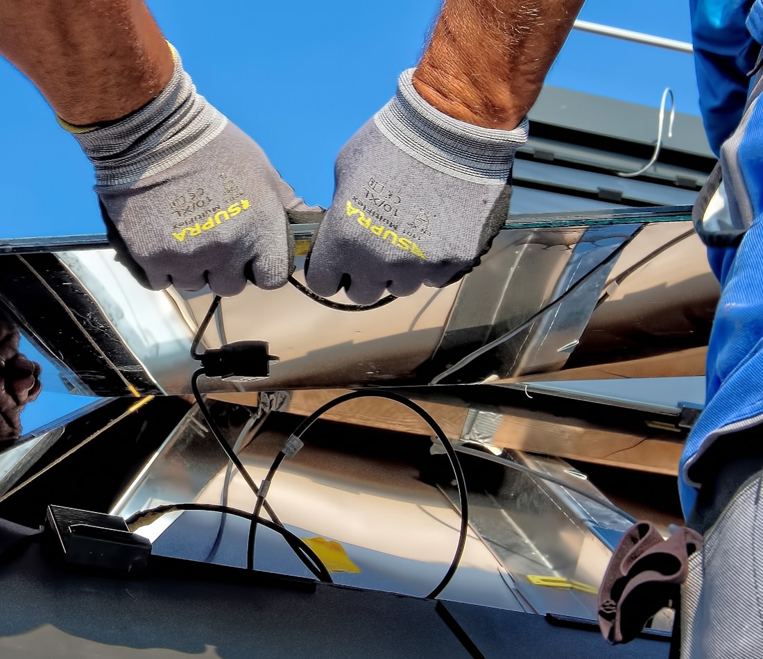 Certified solar installation team at work